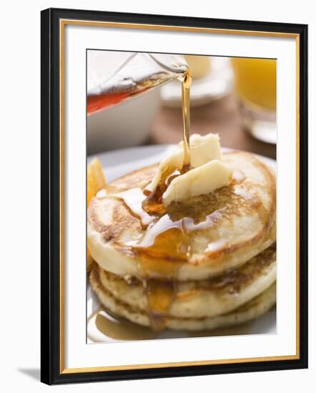 Pouring Maple Syrup over Pancakes with Dab of Butter-null-Framed Photographic Print