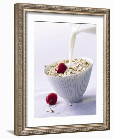 Pouring Milk onto Oat Flakes-null-Framed Photographic Print