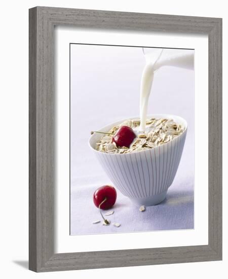 Pouring Milk onto Oat Flakes-null-Framed Photographic Print