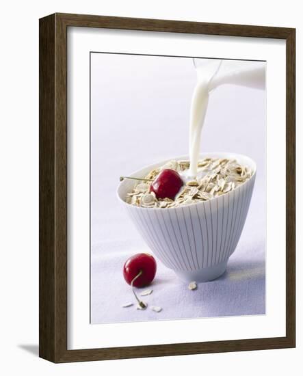 Pouring Milk onto Oat Flakes-null-Framed Photographic Print