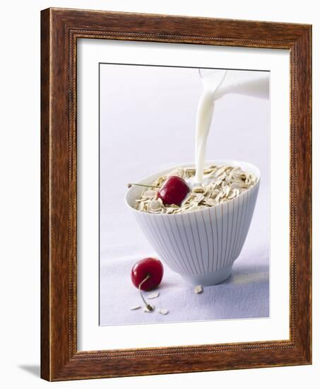 Pouring Milk onto Oat Flakes-null-Framed Photographic Print