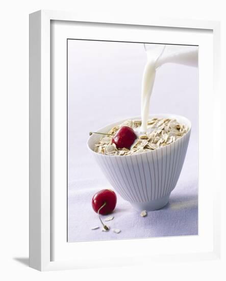 Pouring Milk onto Oat Flakes-null-Framed Photographic Print