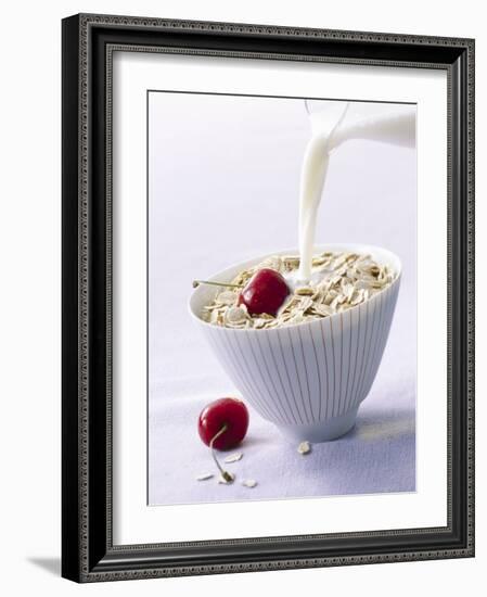 Pouring Milk onto Oat Flakes-null-Framed Photographic Print