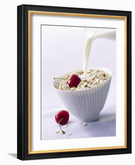 Pouring Milk onto Oat Flakes-null-Framed Photographic Print