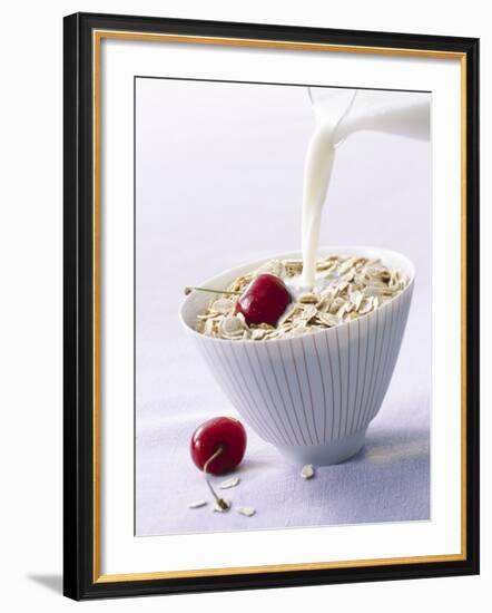 Pouring Milk onto Oat Flakes-null-Framed Photographic Print