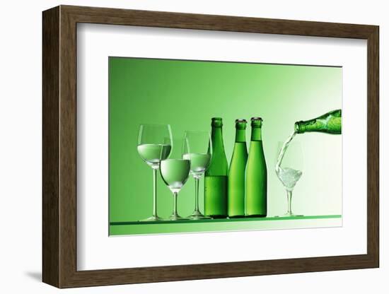 Pouring Mineral Water into Glass-Klaus Arras-Framed Photographic Print