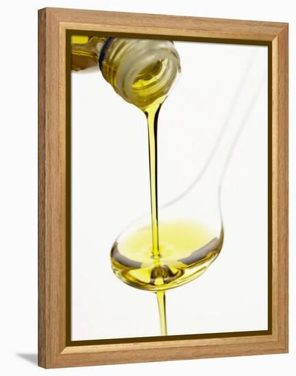 Pouring Olive Oil Over a Spoon-Marc O^ Finley-Framed Premier Image Canvas