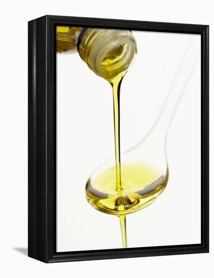 Pouring Olive Oil Over a Spoon-Marc O^ Finley-Framed Premier Image Canvas