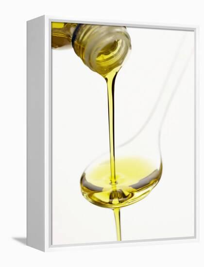 Pouring Olive Oil Over a Spoon-Marc O^ Finley-Framed Premier Image Canvas