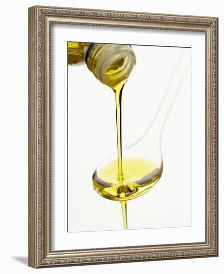 Pouring Olive Oil Over a Spoon-Marc O^ Finley-Framed Photographic Print