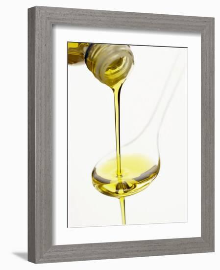 Pouring Olive Oil Over a Spoon-Marc O^ Finley-Framed Photographic Print