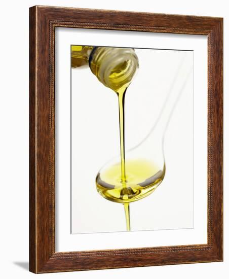 Pouring Olive Oil Over a Spoon-Marc O^ Finley-Framed Photographic Print