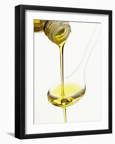 Pouring Olive Oil Over a Spoon-Marc O^ Finley-Framed Photographic Print