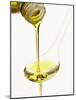 Pouring Olive Oil Over a Spoon-Marc O^ Finley-Mounted Photographic Print