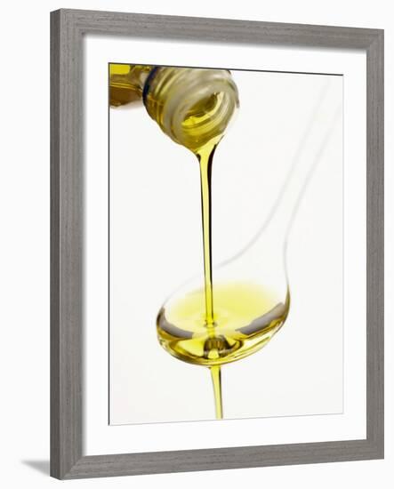 Pouring Olive Oil Over a Spoon-Marc O^ Finley-Framed Photographic Print