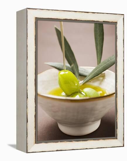 Pouring Olive Oil Over Olive Sprig with Green Olives-null-Framed Premier Image Canvas