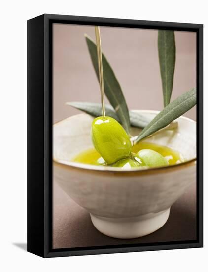 Pouring Olive Oil Over Olive Sprig with Green Olives-null-Framed Premier Image Canvas