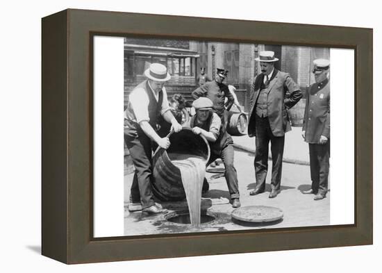 Pouring Out Illegal Alcohol into a Sewer-null-Framed Stretched Canvas