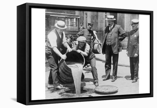 Pouring Out Illegal Alcohol into a Sewer-null-Framed Stretched Canvas