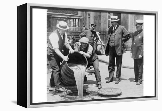 Pouring Out Illegal Alcohol into a Sewer-null-Framed Stretched Canvas