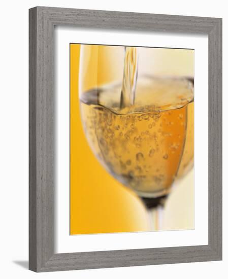 Pouring Prosecco into a Glass-Alexander Feig-Framed Photographic Print