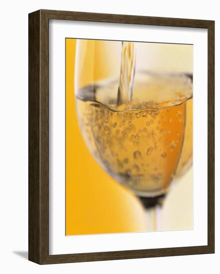 Pouring Prosecco into a Glass-Alexander Feig-Framed Photographic Print