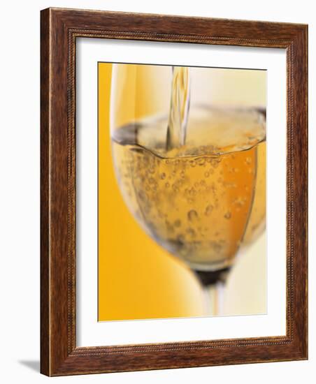 Pouring Prosecco into a Glass-Alexander Feig-Framed Photographic Print