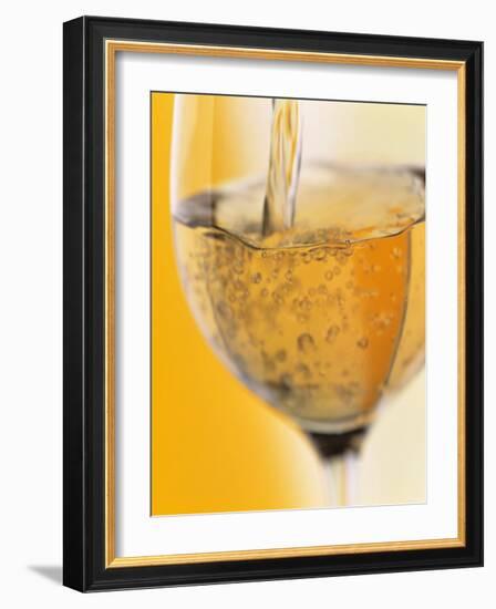 Pouring Prosecco into a Glass-Alexander Feig-Framed Photographic Print