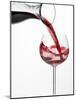 Pouring Red Wine into Glass from Carafe-Kröger & Gross-Mounted Photographic Print