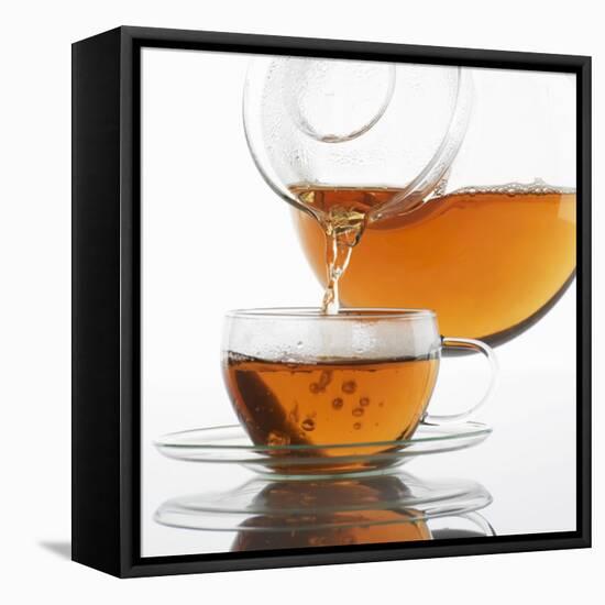 Pouring Tea into a Glass Cup-Alexander Feig-Framed Premier Image Canvas
