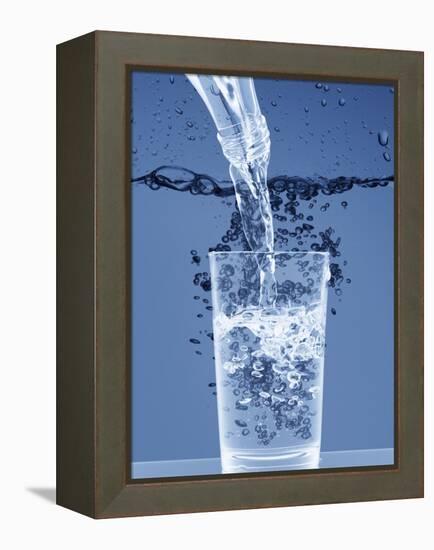 Pouring Water from a Bottle into a Glass-Petr Gross-Framed Premier Image Canvas