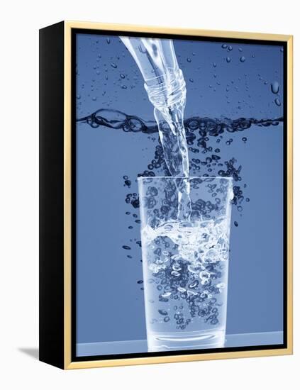 Pouring Water from a Bottle into a Glass-Petr Gross-Framed Premier Image Canvas