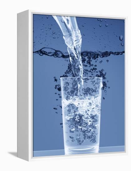 Pouring Water from a Bottle into a Glass-Petr Gross-Framed Premier Image Canvas