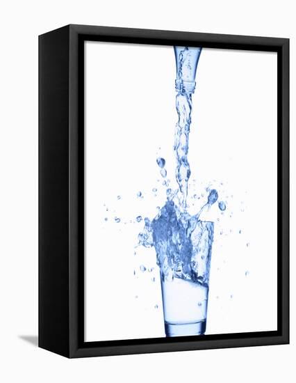 Pouring Water from a Bottle into a Glass-Kr?ger and Gross-Framed Premier Image Canvas