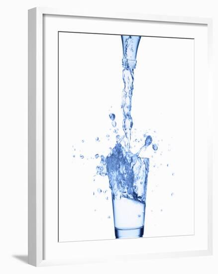 Pouring Water from a Bottle into a Glass-Kr?ger and Gross-Framed Photographic Print