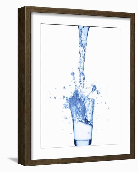 Pouring Water from a Bottle into a Glass-Kr?ger and Gross-Framed Photographic Print