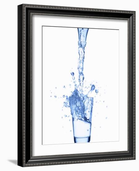 Pouring Water from a Bottle into a Glass-Kr?ger and Gross-Framed Photographic Print