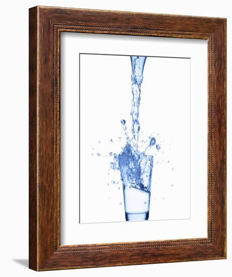 Pouring Water from a Bottle into a Glass-Kr?ger and Gross-Framed Photographic Print