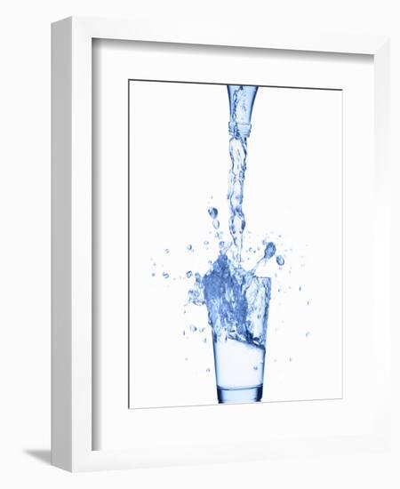 Pouring Water from a Bottle into a Glass-Kr?ger and Gross-Framed Photographic Print