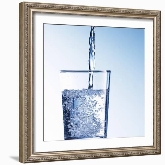 Pouring Water into a Glass-Kai Schwabe-Framed Photographic Print