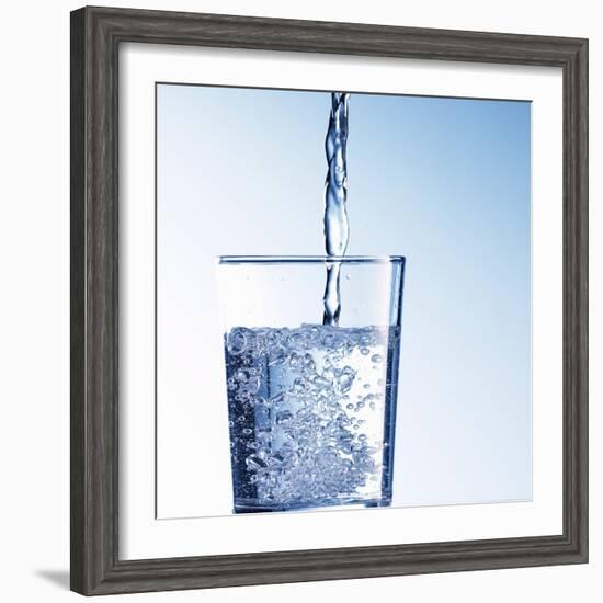 Pouring Water into a Glass-Kai Schwabe-Framed Photographic Print