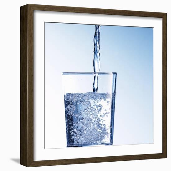 Pouring Water into a Glass-Kai Schwabe-Framed Photographic Print