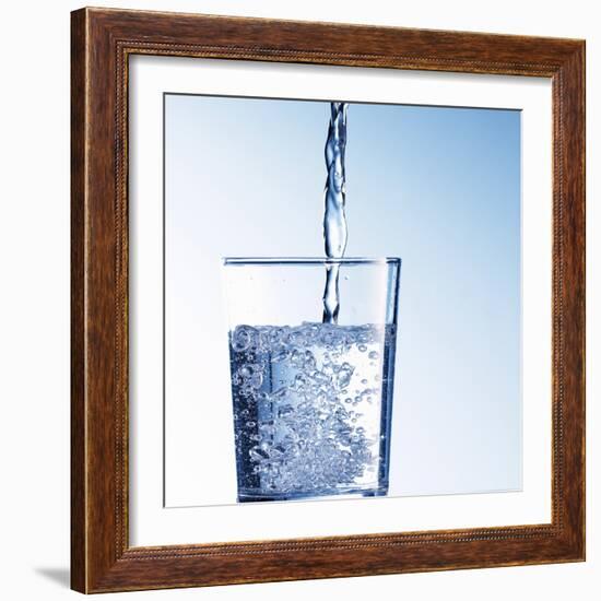 Pouring Water into a Glass-Kai Schwabe-Framed Photographic Print