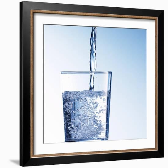 Pouring Water into a Glass-Kai Schwabe-Framed Photographic Print
