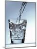 Pouring Water into a Glass-Bodo A^ Schieren-Mounted Photographic Print