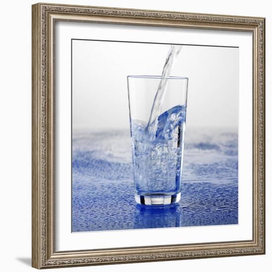Pouring Water into Glass-Alexander Feig-Framed Photographic Print