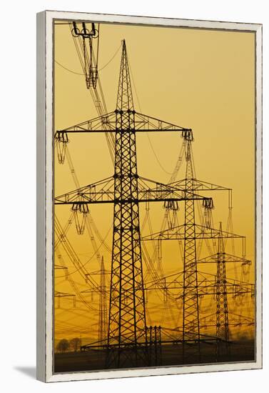 Power lines in morning light, Germany, Europe-Hans-Peter Merten-Framed Premier Image Canvas