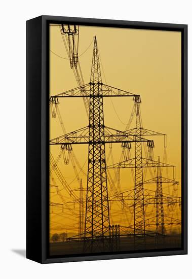 Power lines in morning light, Germany, Europe-Hans-Peter Merten-Framed Premier Image Canvas