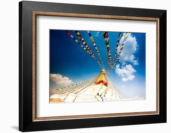 Prayer flags and Buddhist stupa at Bouddha (Boudhanath), UNESCO World Heritage Site, Kathmandu, Nep-Laura Grier-Framed Photographic Print