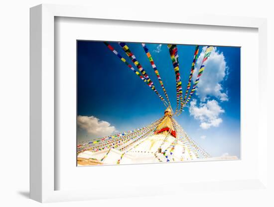 Prayer flags and Buddhist stupa at Bouddha (Boudhanath), UNESCO World Heritage Site, Kathmandu, Nep-Laura Grier-Framed Photographic Print